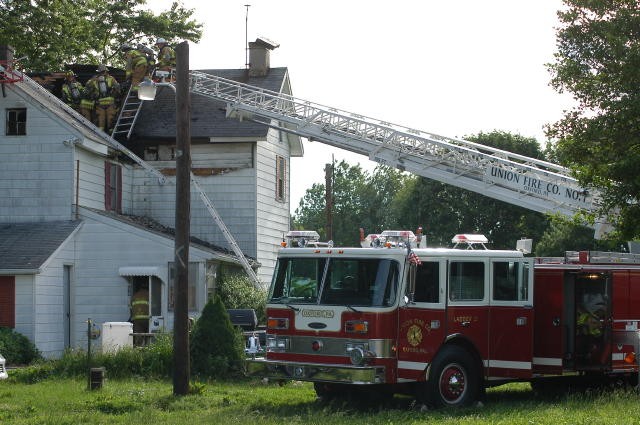 Roof Ops at a state line house fire.